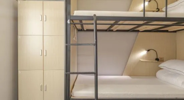 Кровать в общем номере LiuHe Youth Hostel Chongqing