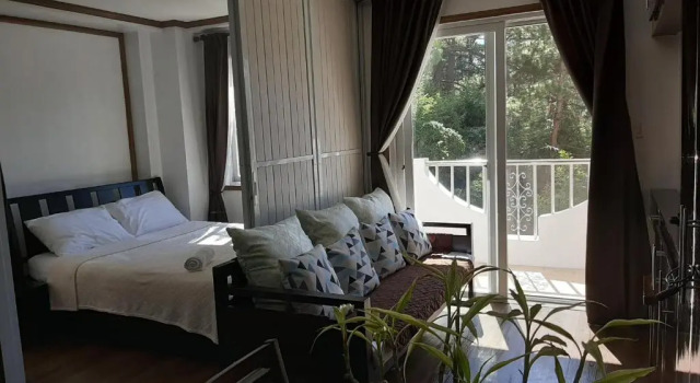 Апартаменты Gab's CozyHome Apartments at Bonbel Condominium
