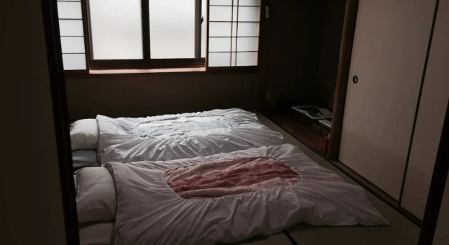 Кровать в общем номере Kyoto Guesthouse Oyado Kei
