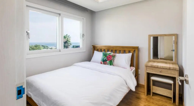 Коттедж с 2 комнатами Jeju Bada Wi Olle Pension