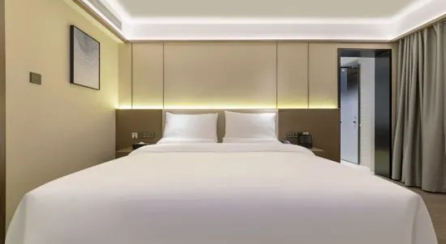 Номер Deluxe Shenlongjia Shunda Hotel