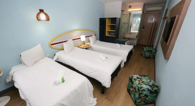 Трёхместный номер Standard Golden Tulip Guarujá - Antigo Delphin Surf Hotel