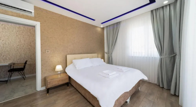 Modern and Central Flat Near Beach in Antalya, Забронировать Отель Анталья провинция Анталья