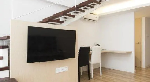 Кровать в общем номере Taiming Hotel