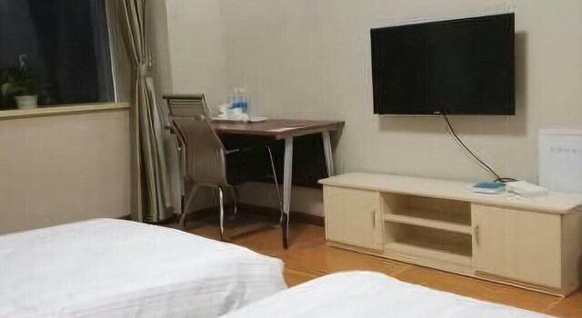 Weihai You Gang Vacation ApartHotel, Забронировать Апарт-отель Отели Вэйхай с парковкой, рядом с Weihai Railway Station, Парковка
