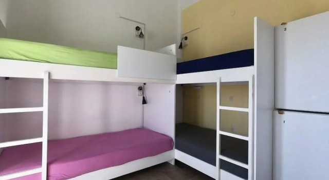 Кровать в общем номере (женский номер) Fira Backpackers Place