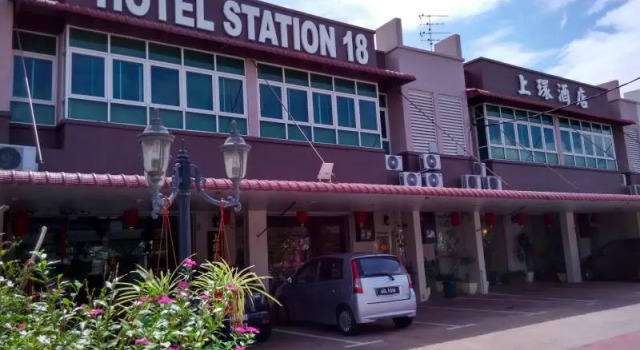 Łóżko w pokoju wieloosobowym Hotel Station 18