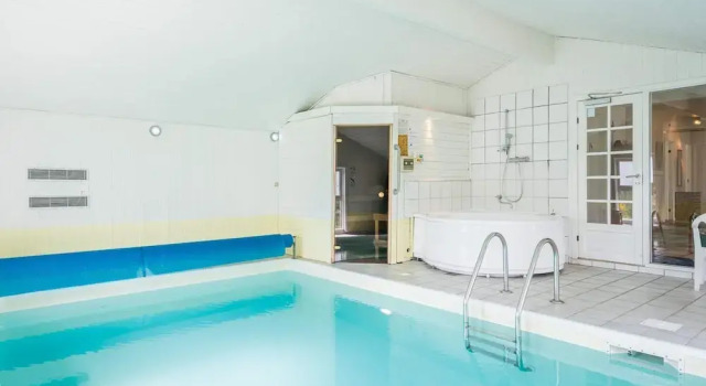 Коттедж 4 star holiday home in Henne