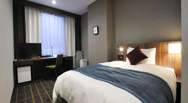 Кровать в общем номере (женский номер) JR-East Hotel Mets Utsunomiya