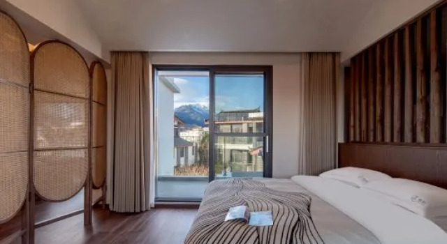 Люкс LiJiang ChunHe Homestay