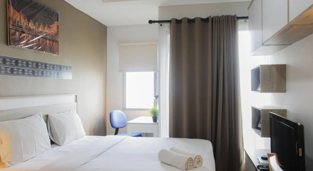 Bright Studio Apartment at Springwood Residence