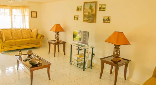 Апартаменты Holidays At Mango Walk Country Club