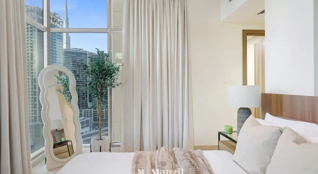 Апартаменты Stylish 2BR With Canal Burj View Near Dubai Mall