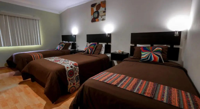 Deluxe triplaágyas szoba Hostal Kolibri