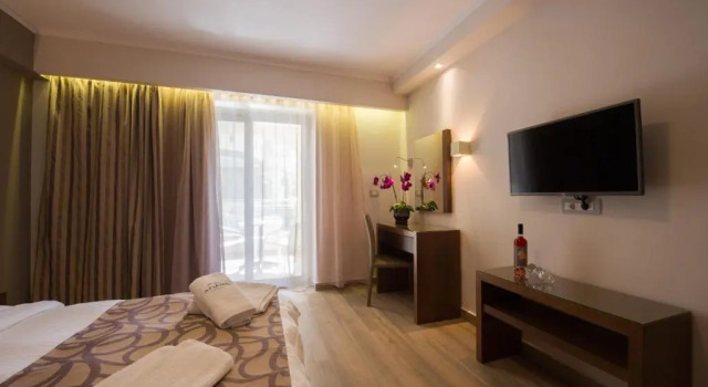 Номер Deluxe Adams Hotel