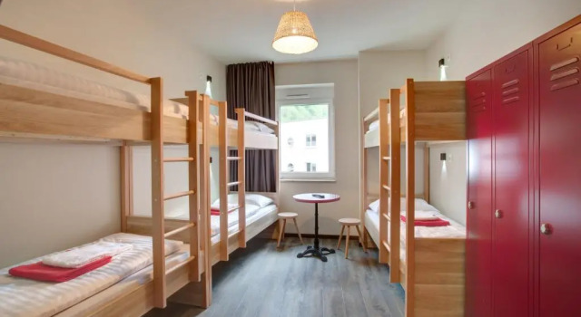 Кровать в общем номере MEININGER Hotel Salzburg City Center