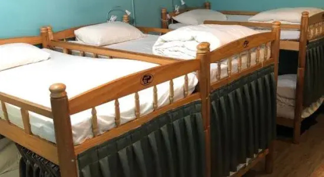 Кровать в общем номере (мужской номер) DongNing Atlas Hotel