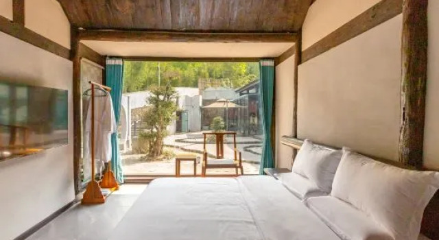 Люкс Emeishan Liangchu Tiansi Tang Homestay