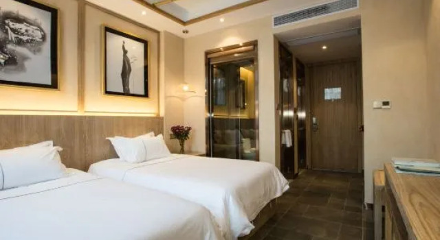 Кровать в общем номере ZhongNan Resort Hotel