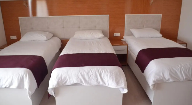 Четырёхместный номер Classic Kuyas Apart Hotel