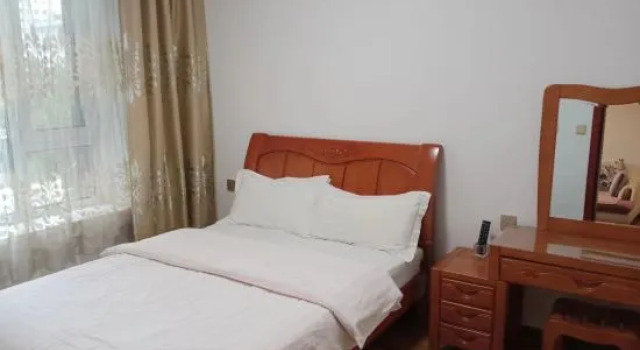 Люкс с 2 комнатами Meichao Apartment (Harbin Zhongshan Road Shop)