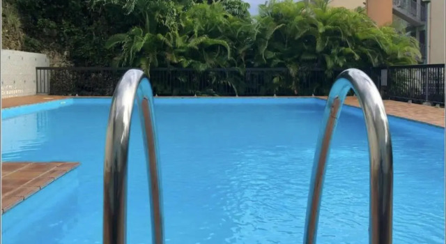 Апартаменты Appartement DUPLEX LAGON BLEU ac Piscine Bas du Fort