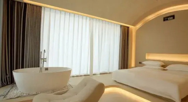 Двухместный люкс Weixi Homestay (Mangshi Square)