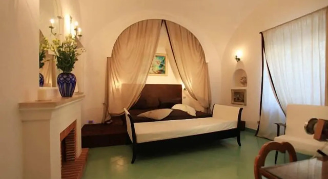 Suite junior con vista al mar Villa Calypso