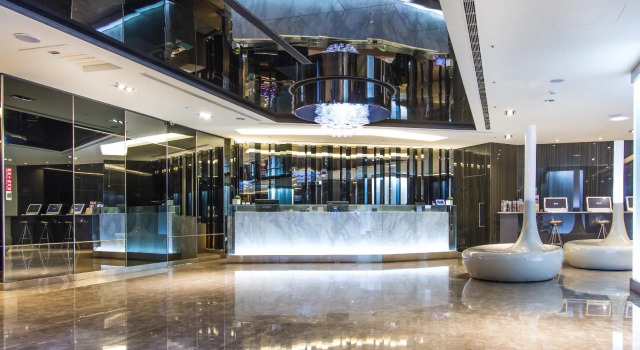 Кровать в общем номере Hotel Reve Taichung