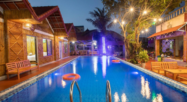 Кровать в общем номере Tam Coc Charming Bungalow
