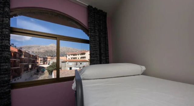 Кровать в общем номере Hostel La Pedriza