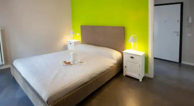 Апартаменты Appartamento GOLFO Residence Comacina