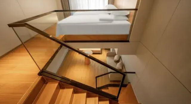 Кровать в общем номере Yinchi Business Hotel (Jinxian County IM Plaza)