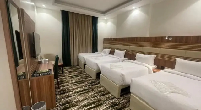 Четырёхместный номер Deluxe مواكب الكوثر التوصيل للحرم متوفر مجانا Mawakib Al Kawthar Hotel Makkah Free transportation to the campus
