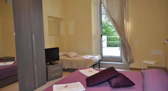 Четырёхместный номер Standard с балконом Guerrini Hotel