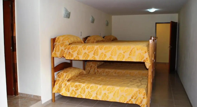 Кровать в общем номере Hostel Pioneros del Valle