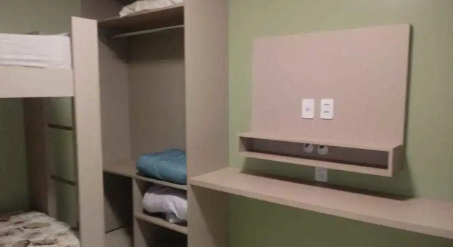 Кровать в общем номере Pousada Golden Cataratas
