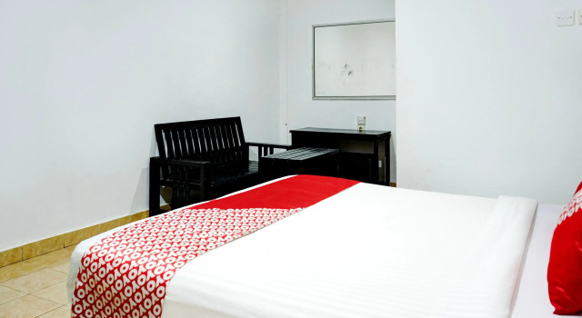 Номер Deluxe Hotel Siti Nurbaya Syariah