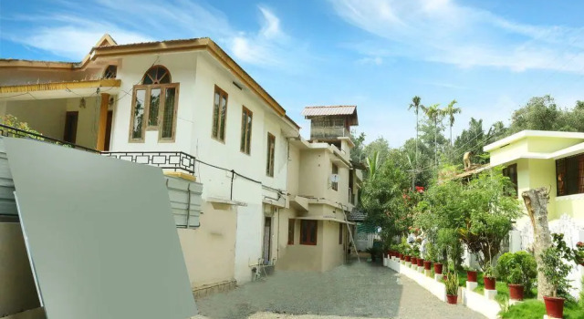 Deluxe Residency, Забронировать Отель Отели штата Кералы с завтраком, Завтраки