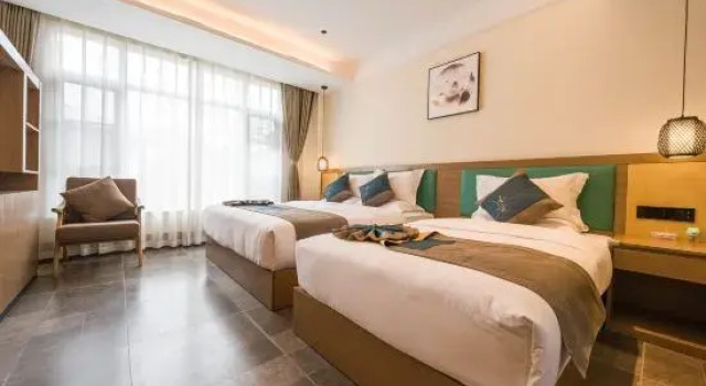 Семейный люкс Songfengju Courtyard Hotel (Xingyi Wanfenglin Airport & High-speed Railway Station Branch)