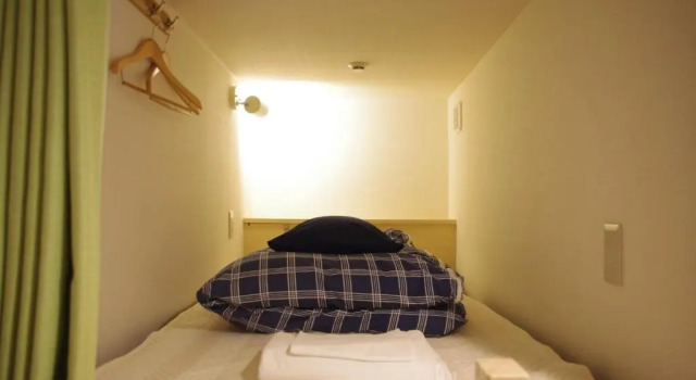 Кровать в общем номере K's House Mt.Fuji