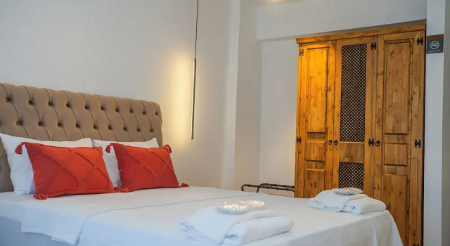 Luxo quarto Aris Guest House