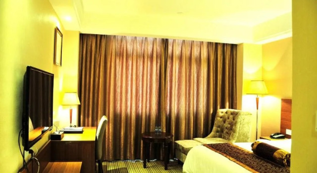 Harmonious Dunpu Hotel, Prenota Hotel Qiandongnan Cina