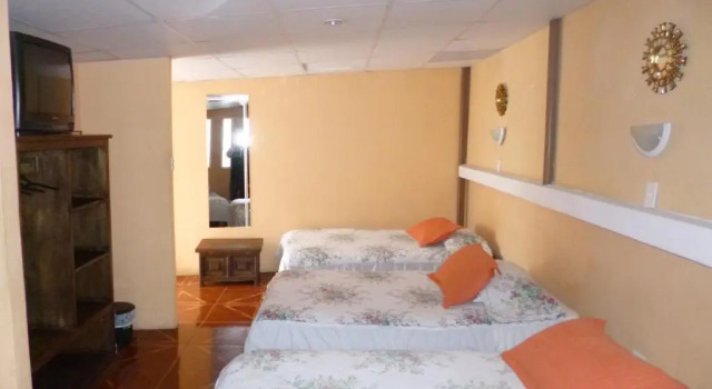 Кровать в общем номере Hotel Andino