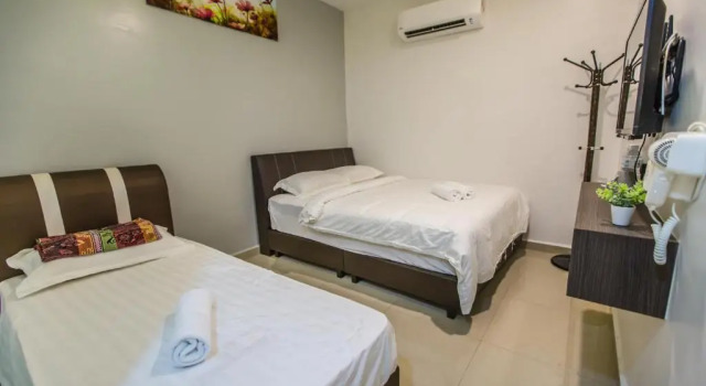 Номер Deluxe U Plus Budget Hotel