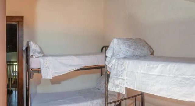 Кровать в общем номере Albergue ANoguera