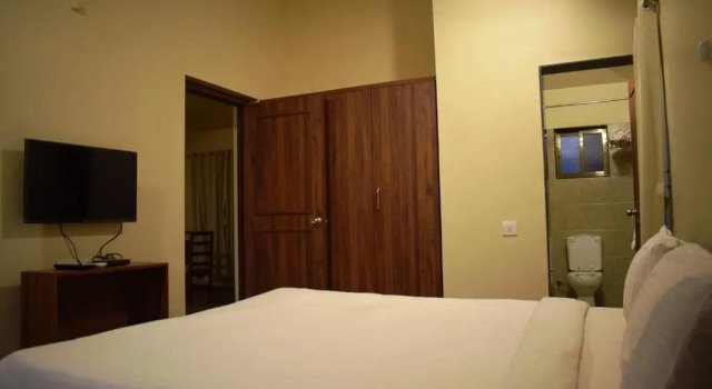 Коттедж с 4 комнатами Mango Village Resort