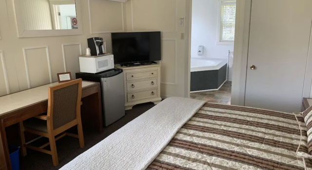 Двухместный люкс Deluxe The Lionstone Inn Motel and Cottages