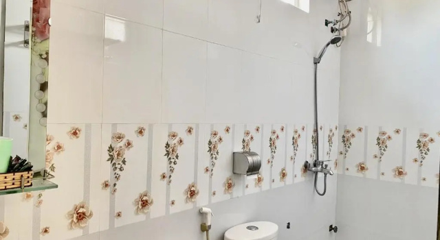 Кровать в общем номере Tien's Cozy Homestay