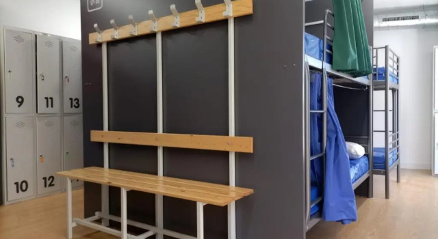 Кровать в общем номере Albergue Avoa Regina